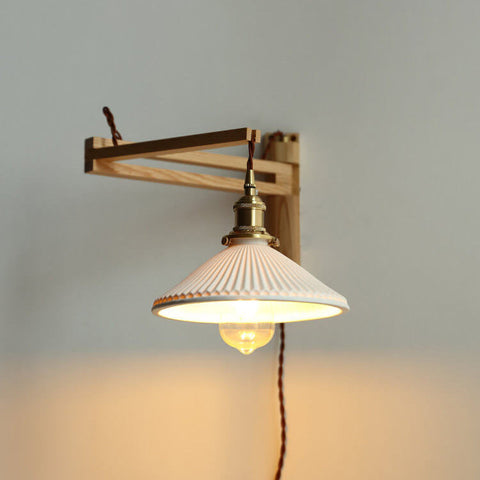 Retractable Wood Wall Sconce with Ribbed Glass Shade for Reading