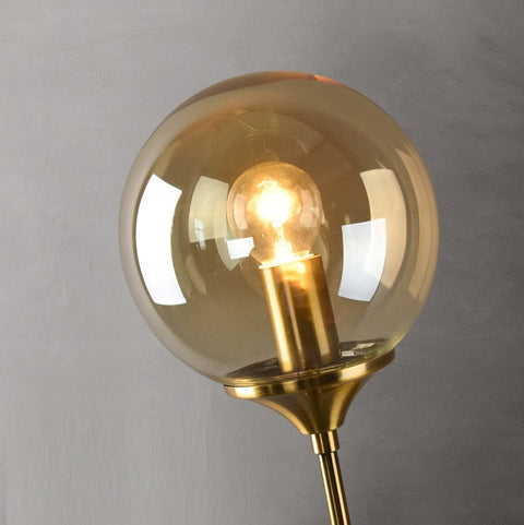 Brushed Metal and Glass Globe Wall Sconce for Modern Living Rooms