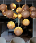 Solid Wood Globe Pendant Light with Suspended Sphere — product view