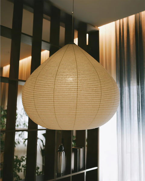 Pendant Light with Ribbed Paper Shade and Adjustable Suspension