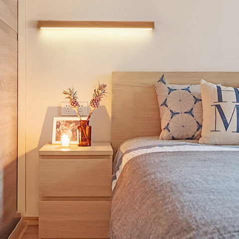 Solid Wood Linear LED Wall Sconce with Warm Accent Lighting