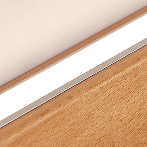 Solid Wood Linear LED Wall Sconce with Warm Accent Lighting