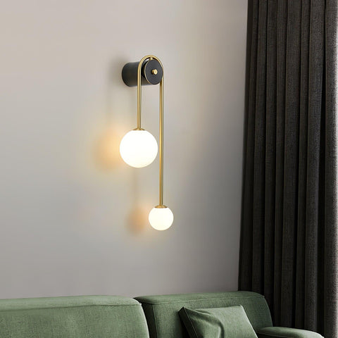 Wall Sconce with Curved Brass Arms and Asymmetric Glass Globes