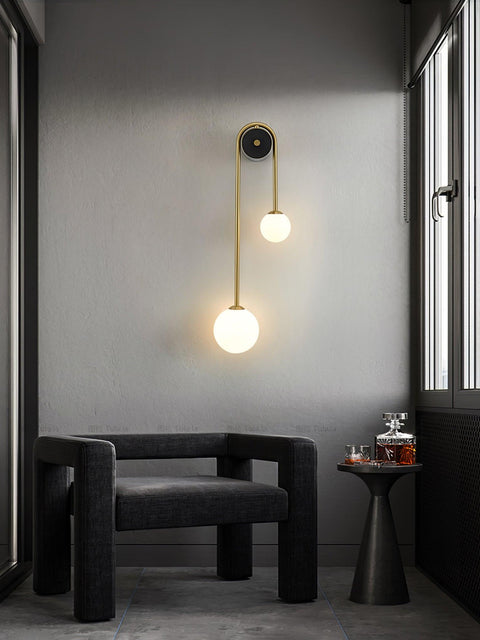 Wall Sconce with Curved Brass Arms and Asymmetric Glass Globes