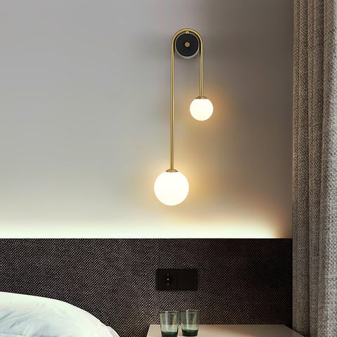 Wall Sconce with Curved Brass Arms and Asymmetric Glass Globes