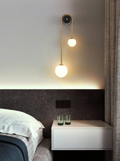 Wall Sconce with Curved Brass Arms and Asymmetric Glass Globes