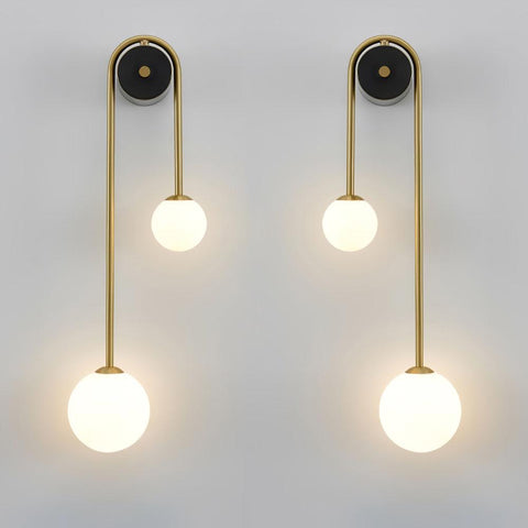 Wall Sconce with Curved Brass Arms and Asymmetric Glass Globes