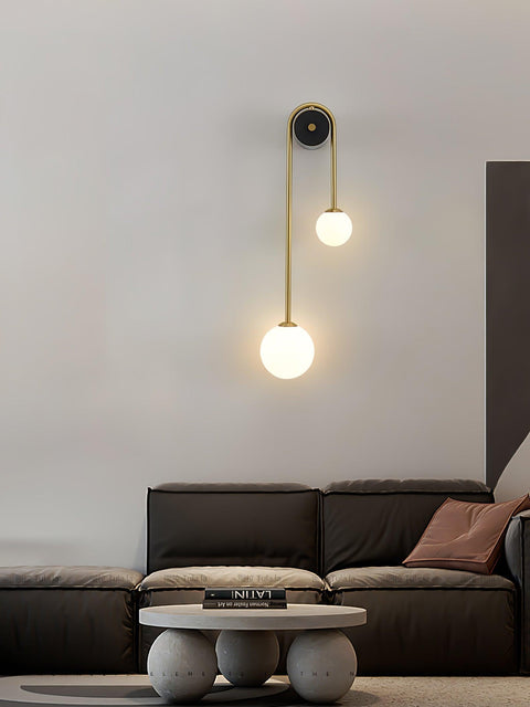 Wall Sconce with Curved Brass Arms and Asymmetric Glass Globes