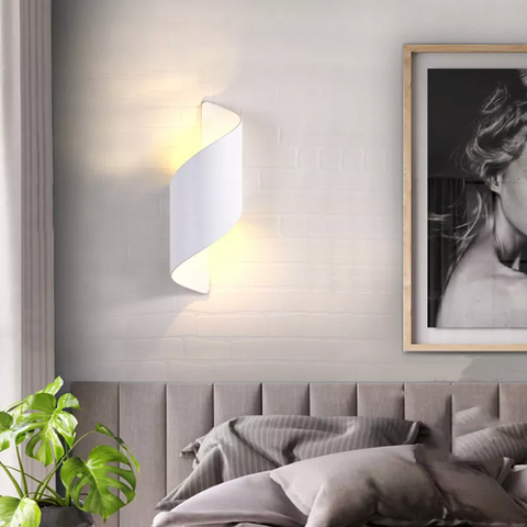 Curved LED Wall Sconce with Sculptural Spiral Form for Interiors