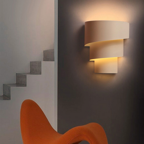 Curved LED Wall Sconce with Sculptural Spiral Form for Interiors