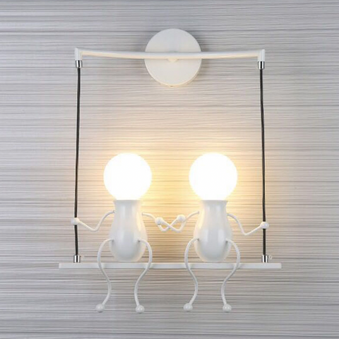 Swinging Figure Wall Light for Playful Bedroom Accent Illumination
