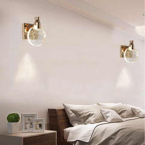 Round Glass Wall Sconce with Decorative Crystal Effect and Metallic Mount