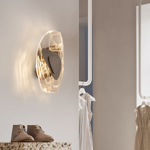 Wall Sconce with Rippled Glass Shade and Sculptural Metal Center