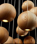 Solid Wood Globe Pendant Light with Suspended Sphere — product view