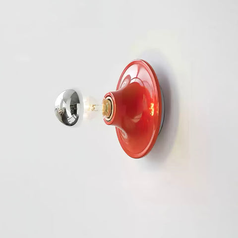 Wall Sconce with Flared Metal Base and Exposed Glass Bulb Design