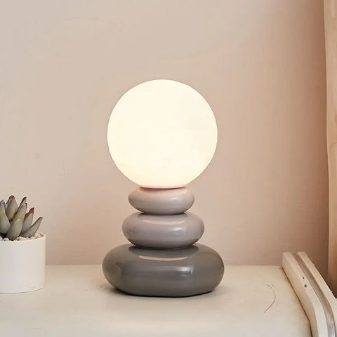 LED Table Lamp with Glazed Ceramic Base and Textured Lunar Globe