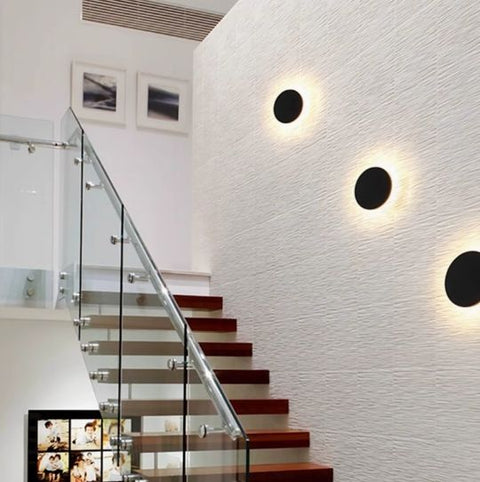 Wall Sconce with Round Backlit LED Design
