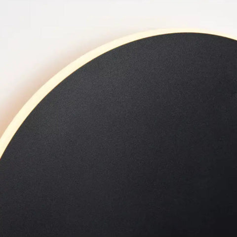 Wall Sconce with Round Backlit LED Design