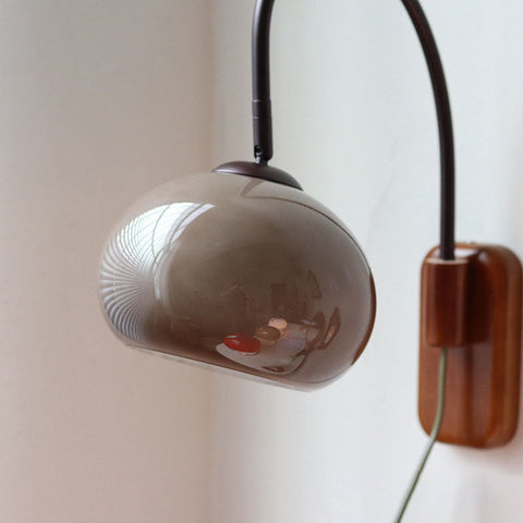 Wood and Glass Globe Wall Sconce with Curved Metal Arm for Bedside