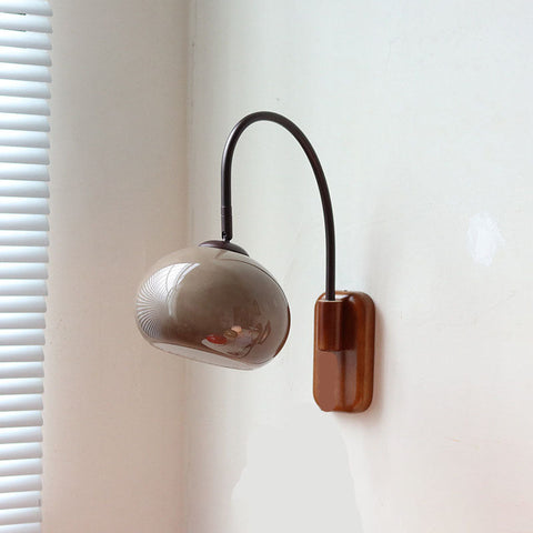 Wood and Glass Globe Wall Sconce with Curved Metal Arm for Bedside
