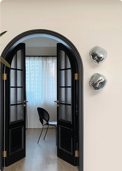 Glass Wall Sconce with Metal Frame and Sculptural Shade — product view