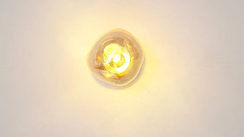 Glass Wall Sconce with Metal Frame and Sculptural Shade — product view