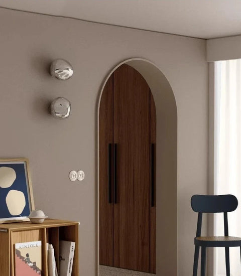 Glass Wall Sconce with Metal Frame and Sculptural Shade — product view