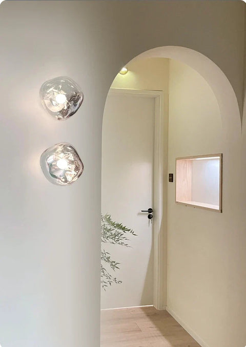 Glass Wall Sconce with Metal Frame and Sculptural Shade — product view