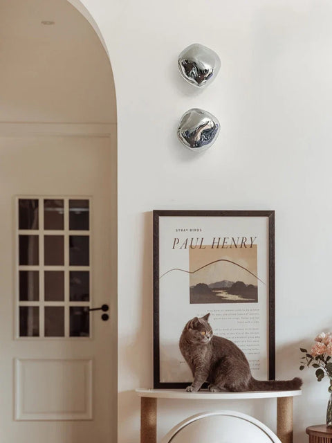 Glass Wall Sconce with Metal Frame and Sculptural Shade — product view