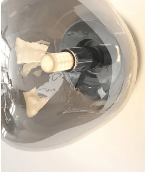 Glass Wall Sconce with Metal Frame and Sculptural Shade — product view