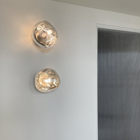 Glass Wall Sconce with Metal Frame and Sculptural Shade — product view