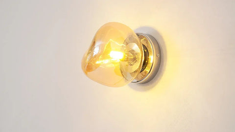 Glass Wall Sconce with Metal Frame and Sculptural Shade — product view