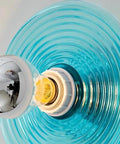 Ribbed Glass Wall Sconce with Retro Metal Mount — product view
