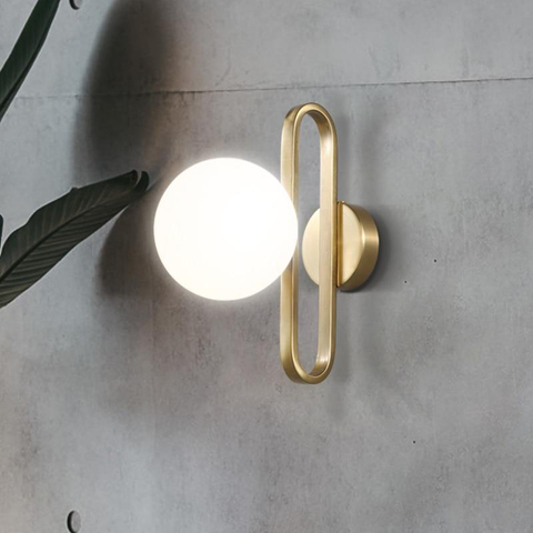 Wall Sconce with Frosted Glass Globe and Brushed Metal Loop Frame