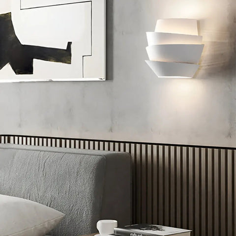 Layered Metal Wall Sconce with Up and Down Lighting for Indoor Spaces