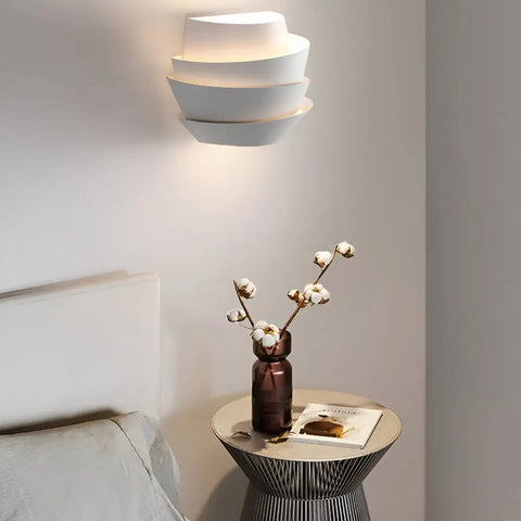 Layered Metal Wall Sconce with Up and Down Lighting for Indoor Spaces