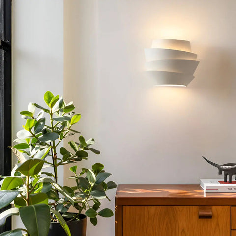 Layered Metal Wall Sconce with Up and Down Lighting for Indoor Spaces