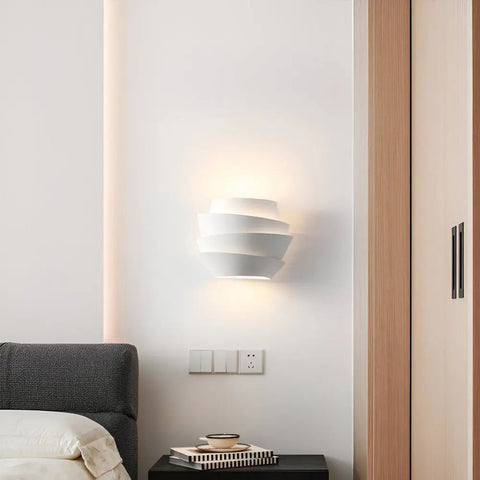 Layered Metal Wall Sconce with Up and Down Lighting for Indoor Spaces