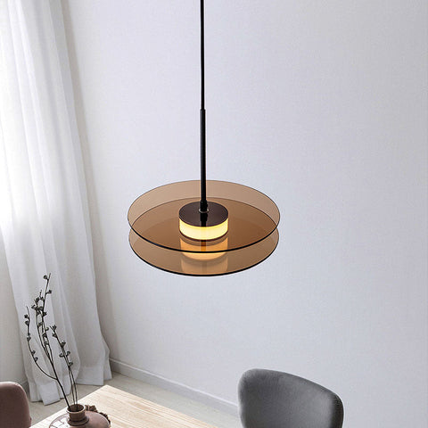 LED Pendant Light with Layered Glass Discs and Warm Ambient Lighting
