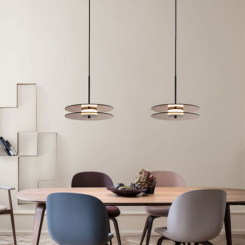 LED Pendant Light with Layered Glass Discs and Warm Ambient Lighting