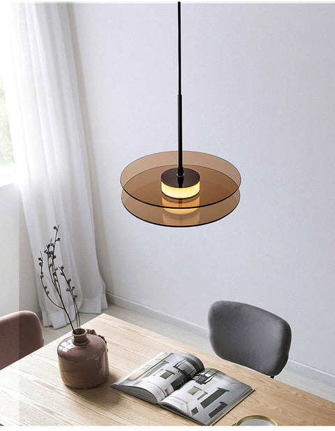 LED Pendant Light with Layered Glass Discs and Warm Ambient Lighting