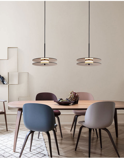 LED Pendant Light with Layered Glass Discs and Warm Ambient Lighting