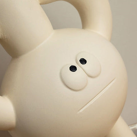 Playful Character Table Lamp with Glass Globe and Sculptural Resin Base for Indoor Spaces