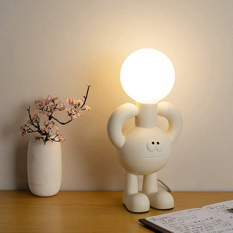 Playful Character Table Lamp with Glass Globe and Sculptural Resin Base for Indoor Spaces