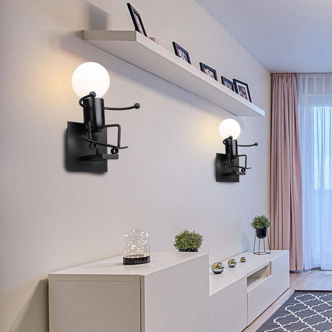 Seated Figure Metal Wall Sconce for Playful Interior Accent Lighting
