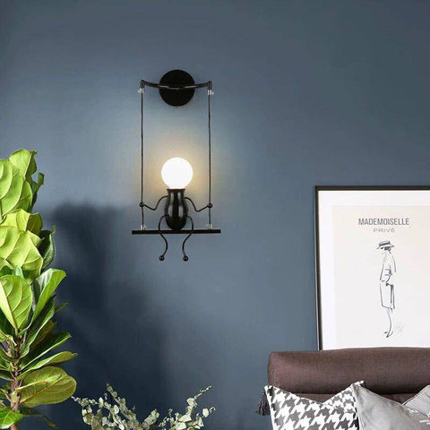 Swinging Figure Wall Light for Playful Bedroom Accent Illumination