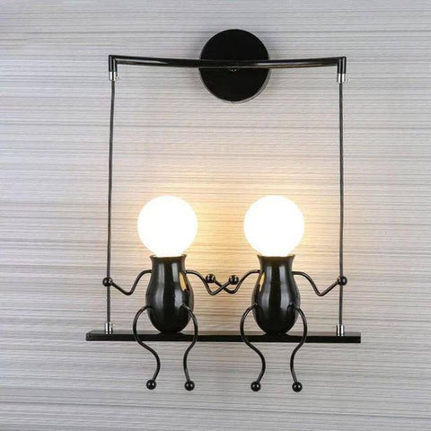 Swinging Figure Wall Light for Playful Bedroom Accent Illumination