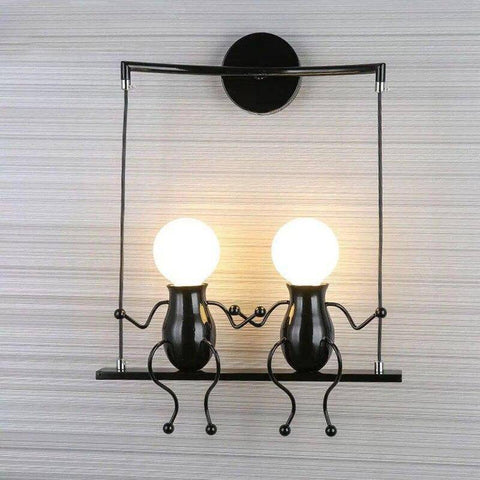 Swinging Figure Wall Light for Playful Bedroom Accent Illumination
